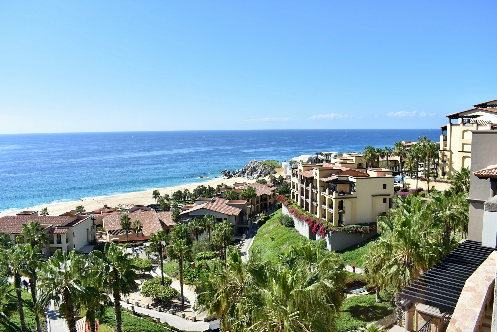 An ocean view of some of the best honeymoon resorts in Cabo.