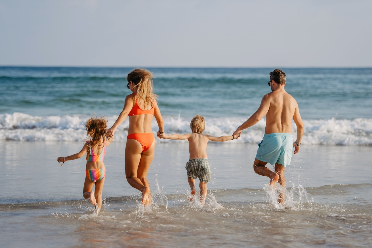 Family Walking on Los Cabos Beach