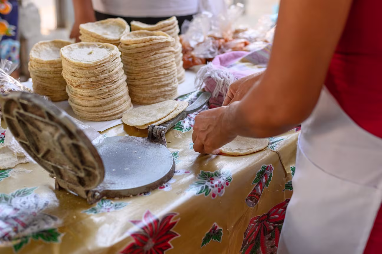 Traditional Mexican Fresh Hand-Pressed Tortillas being made in Los Cabos