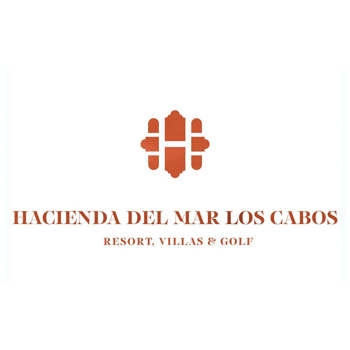 Object: orange, symmetrical geometric emblem above bold orange branding text on a white background. Action: emblem sits centered above the text. Context: text reads HACIENDA DEL MAR LOS CABOS; RESORT, VILLAS & GOLF.