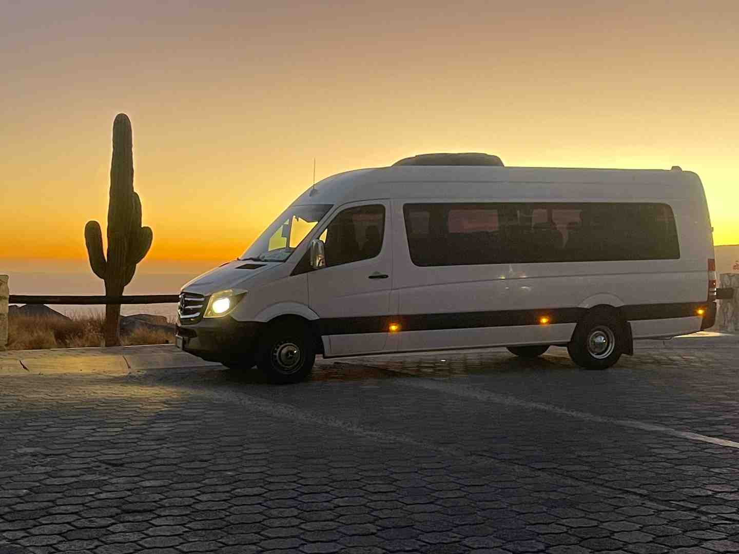 SJD Taxi van on dirt road - fox canyon cabo