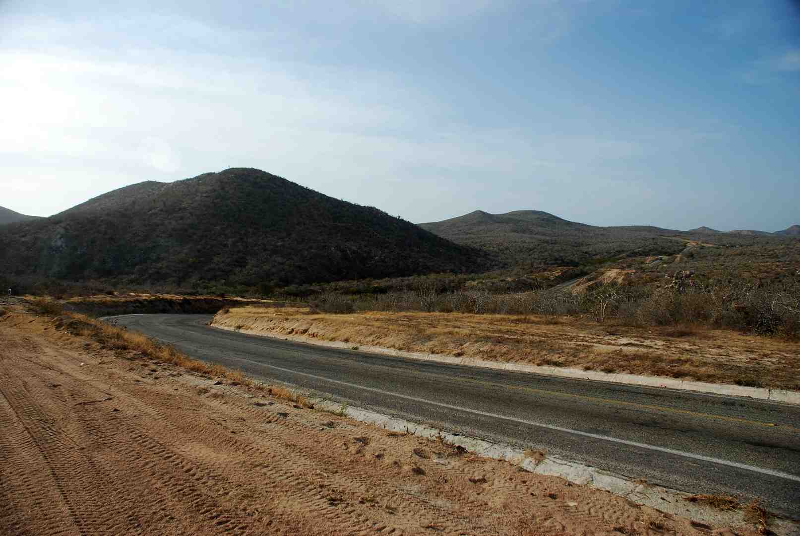 SUV driving on desert road in Baja California Sur - cabo rental cars