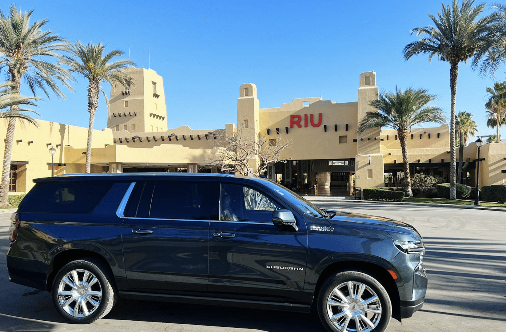 family loading luggage into a private SJD Taxi Suburban - Shuttle SJD to Cabo San Lucas
